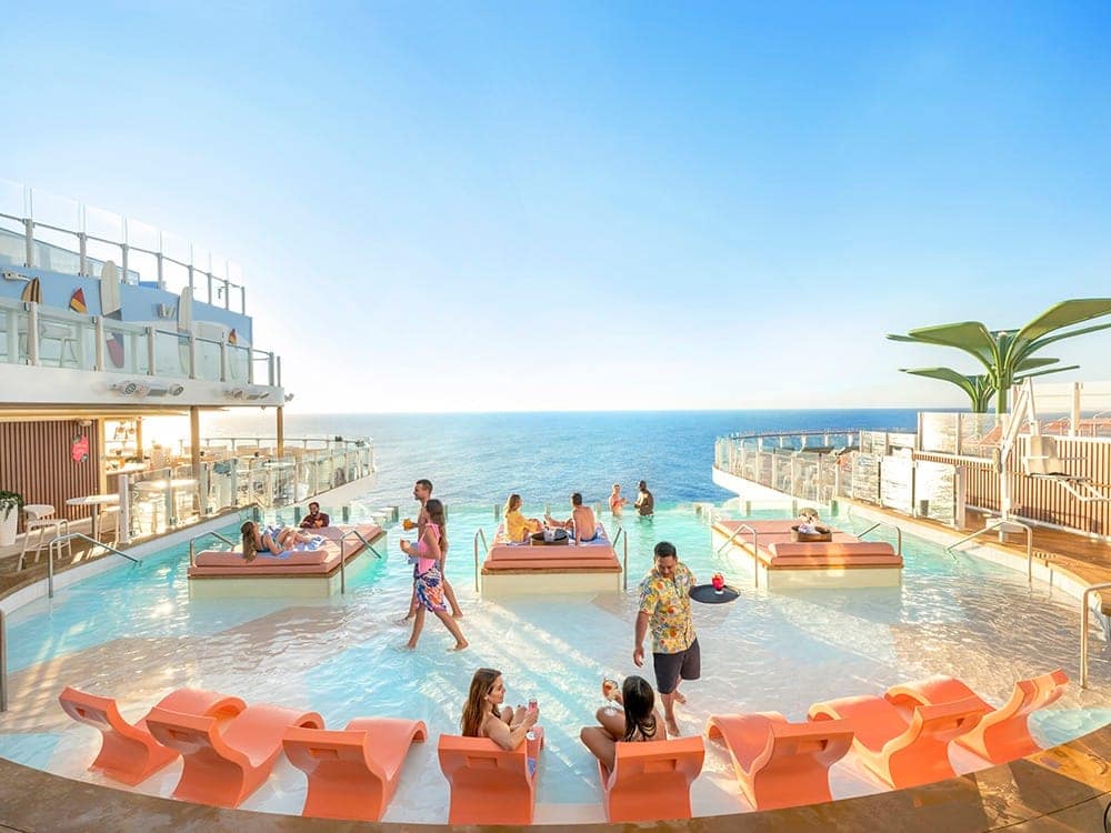 Tucked away 135 feet above the ocean on Royal Caribbean’s Icon of the Seas and the soon-to-debut Star of the Seas, The Hideaway is an adults-only neighborhood that combines uninterrupted ocean views with beach club vibes, and at the center of it all is the only suspended infinity pool at sea. Alongside the best “seat” in the house is a dedicated bar, a DJ and a multilevel terrace with whirlpools and loungers.