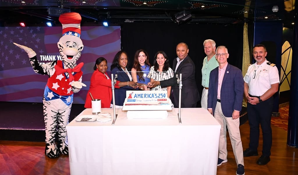Carnival Cruise Line leaders, port partners and city officials cut cake during America's 250th anniversary