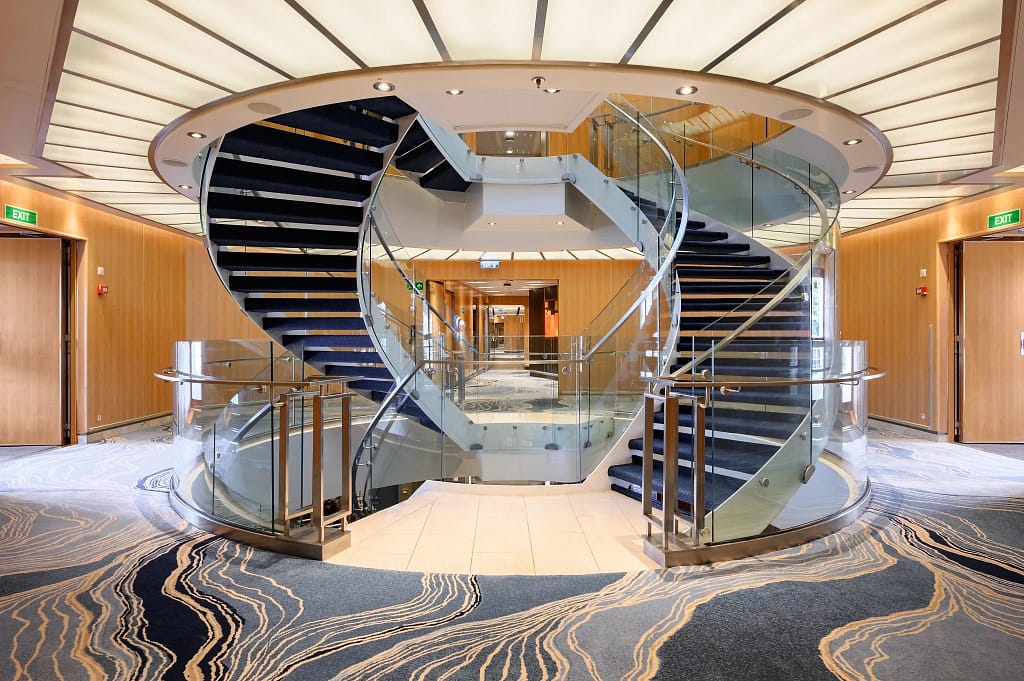 The Seabourn Quest atrium, corridors and stairways received new carpeting, featuring patterns inspired by the organic movement of water