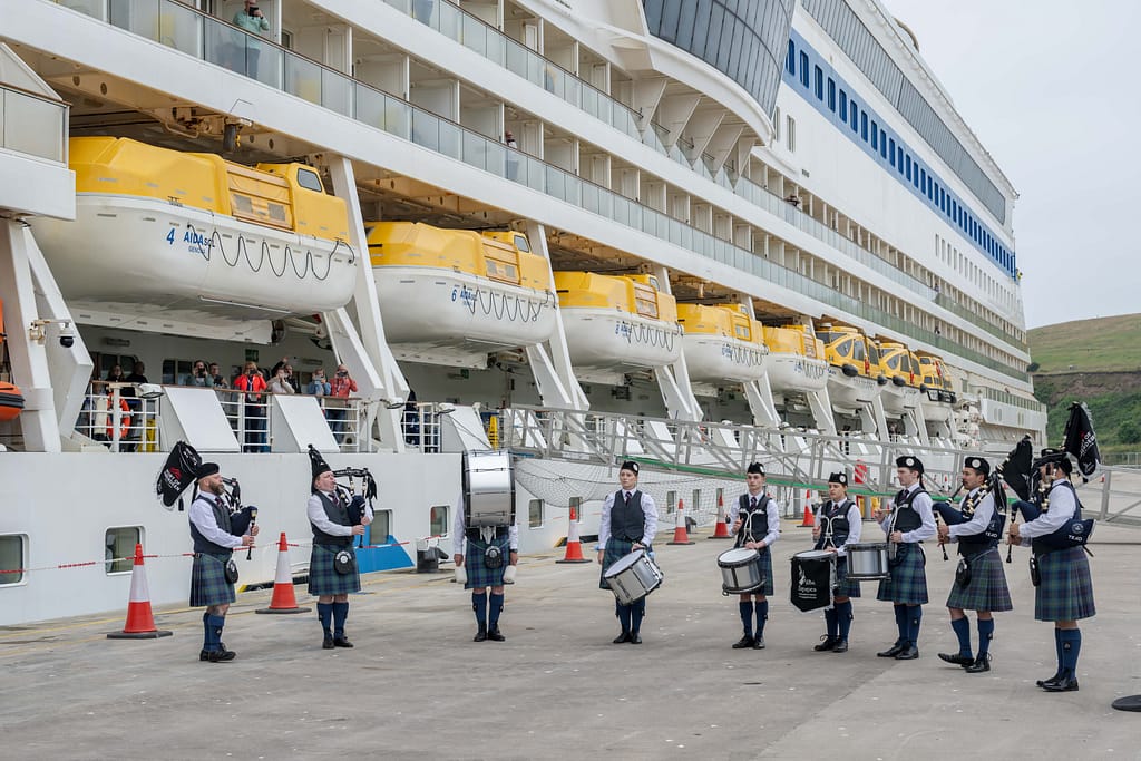 Local pipers welcoming cruise guests on the quayside at Port of Aberdeen’s South Harbour