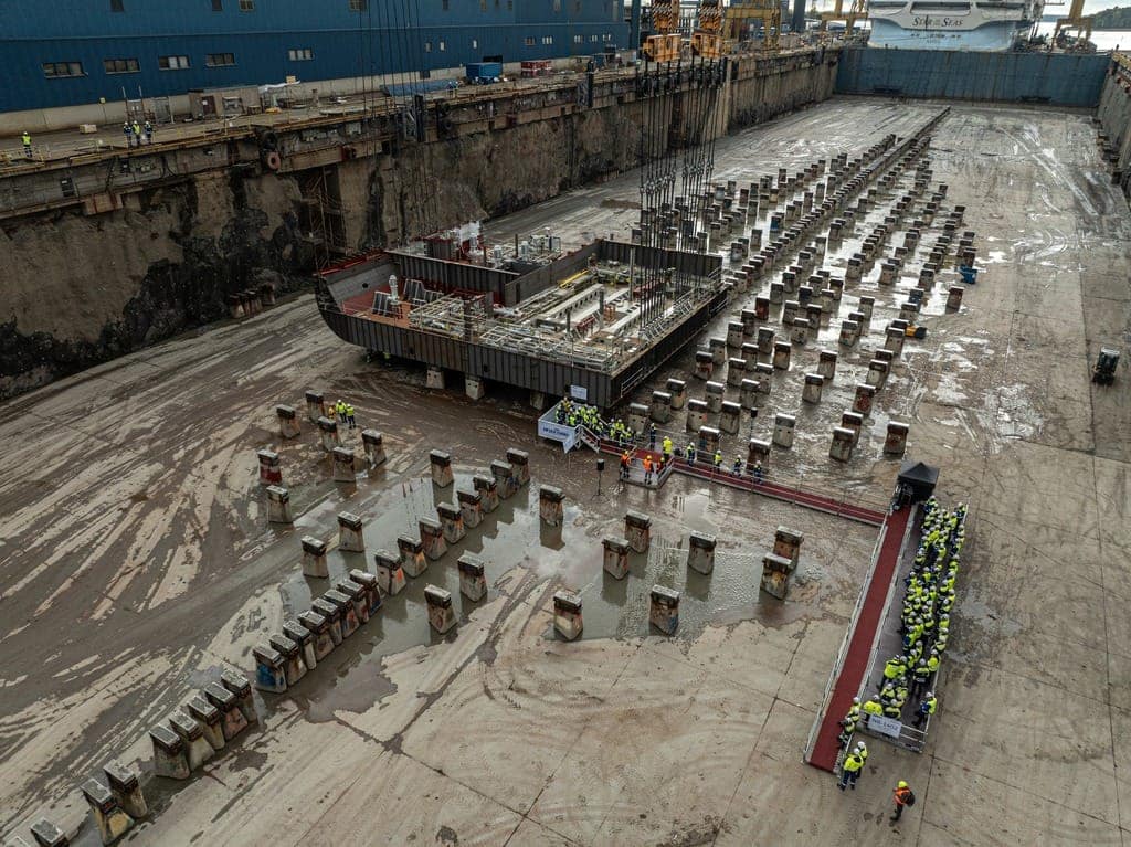 Royal Caribbean International kicked off the start of physical construction on the third Icon Class vacation that debuts in 2026. A keel-laying celebration took place at Finnish shipyard Meyer Turku, where the first block of the soon-to-be-named ship was lifted and placed onto a layer of freshly minted coins.