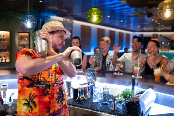 The Bamboo Room on Navigator of the Seas is a laidback Polynesian bar serving up craft cocktails and shareable bites