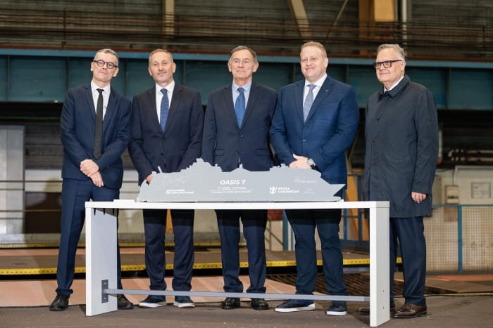 Royal Caribbean’s seventh Oasis Class ship is officially under way. The start of the newest game-changing vacation’s construction was marked at the Chantiers de l’Atlantique shipyard in Saint-Nazaire, France, with a steel-cutting ceremony