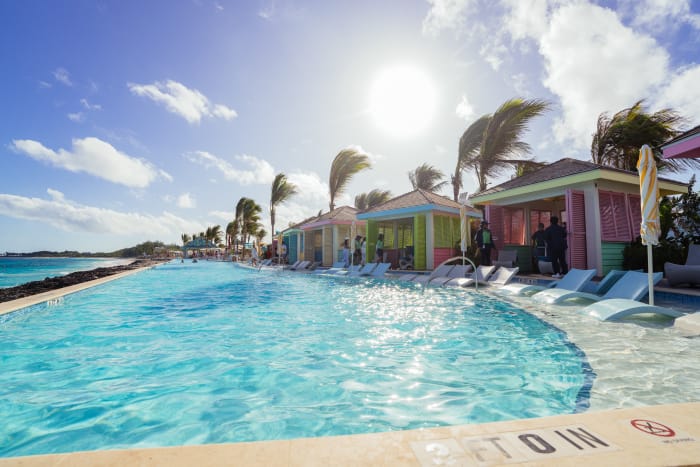 At Royal Caribbean’s Royal Beach Club Paradise Island, vacationers can kick back and unwind poolside at The Deep End Pool and swim-up bar in Chill Beach for sun-kissed lounging