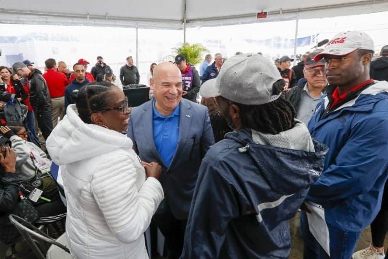 David J. Herrera, Norwegian Cruise Line President and U.S. veteran, and Jesse Iwuji, Xfinity series driver and U.S. Veteran, met with Gold Star families at the Coca-Cola 600 at Charlotte Motor Speedway