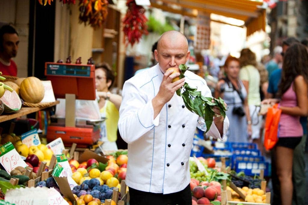 SeaDream Yacht Club was the first cruise line to introduce a full plant-based menu, and currently offer the widest selection of plant-based alternatives at sea. Fleet Executive Chef Tomasz Kozlowski shopping for greens at a local market