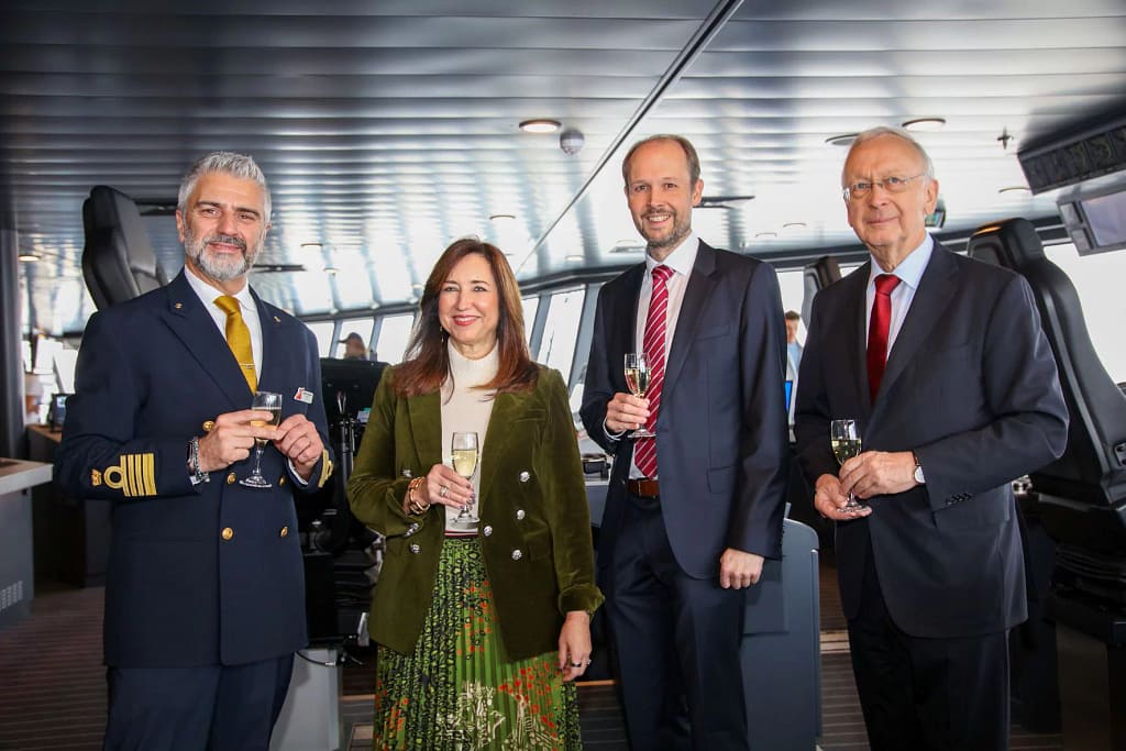 Captain Andrea Catalani, Christine Duffy, Jan Meyer and Bernard Meyer toast the delivery of Carnival  Jubilee