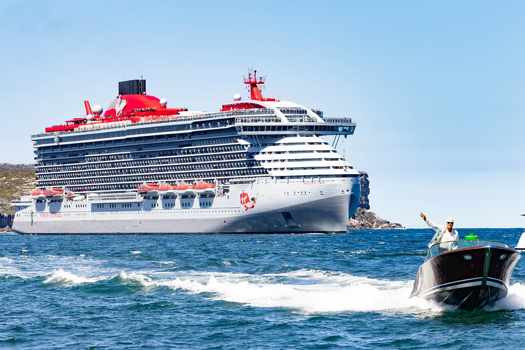 Sir Richard Branson guides Resilient Lady into Sydney Harbour