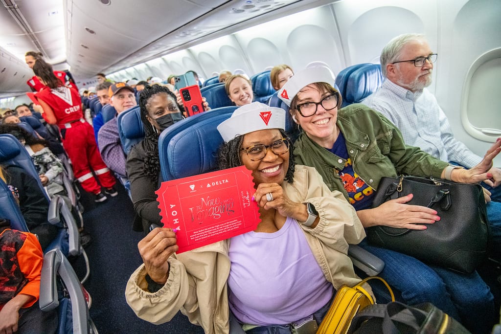 Delta Air Lines ane Virgin Voyages come together to give away a pair of tickets to each passenger on a flight to San Juan, Puerto Rico from Atlanta, Georgia at Hartsfield Jackson international Airport on Thursday February 29, 2024. (Chris Rank/ Rank Studios)