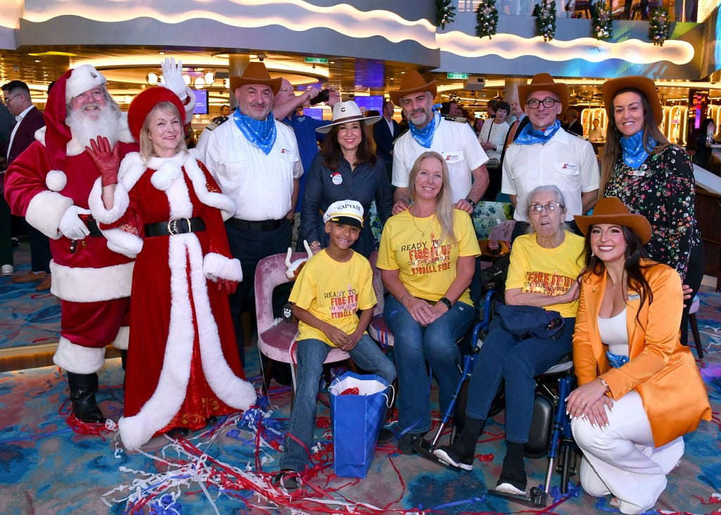 Carnival Cruise Line President Christine Duffy welcomes first family aboard Carnival Jubilee