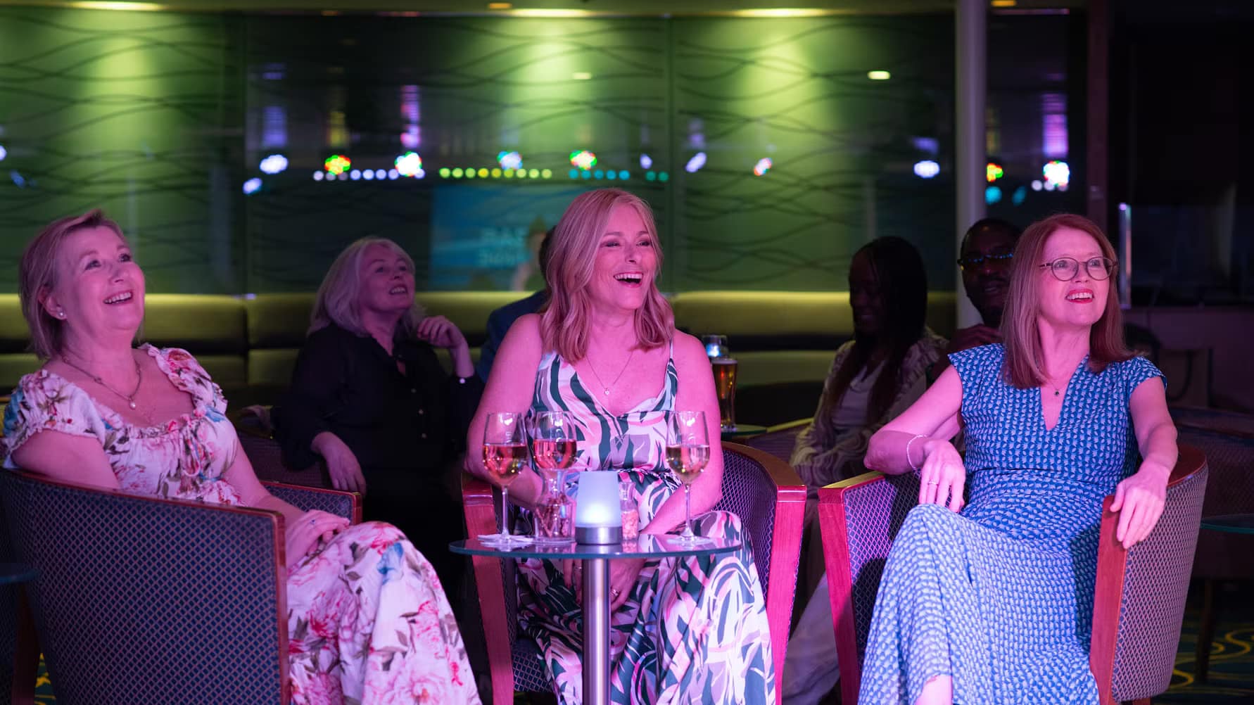 Guests watching the entertainment in the Lido Lounge, Fred. Olsen Cruise Lines' Balmoral
